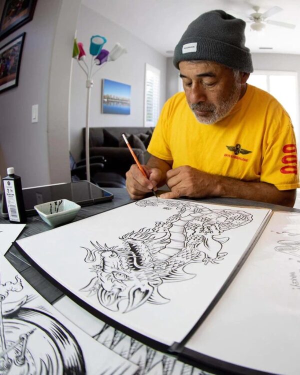 Caballero drawing a dragon