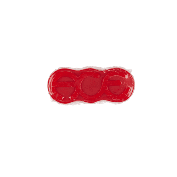 Top view of the front side of the red wax block with the "ACE" logo front and center, wrapped in see-through shrink wrap.